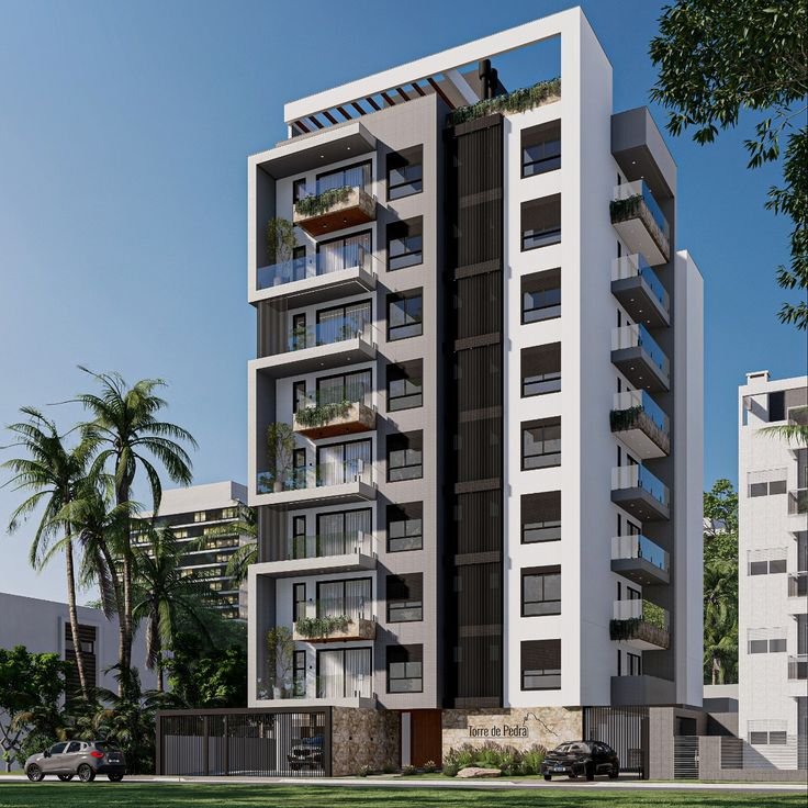 A modern multi-story apartment building with balconies and a contemporary design, built in Coimbatore by experienced constructions and developers